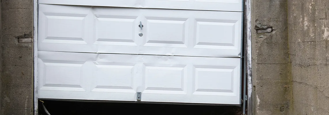 Garage Door Got Hit By A Car Dent Removal in Decatur, IL