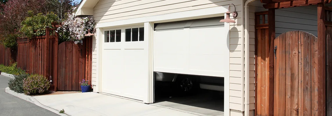 Fix Metal Garage Door Jerking in Decatur, Illinois